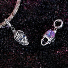 Skull in Hand Pendant