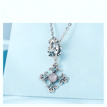 Iris Cross Pendant