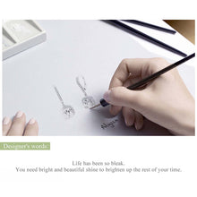 Geometric Earrings With Zircon