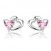 Heart-shaped earrings with pink zirconia