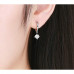 Round earrings with zircon